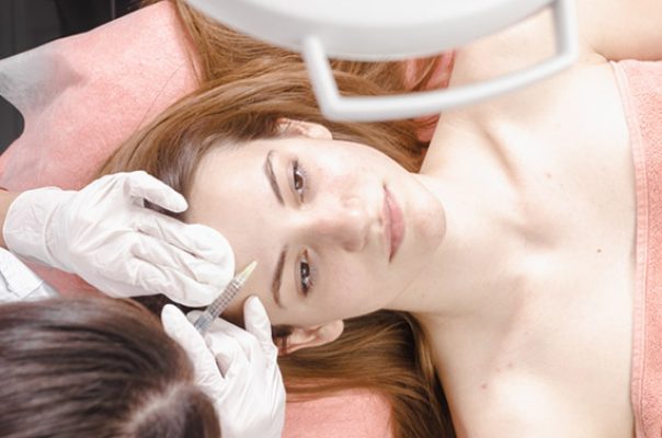 young-woman-getting-dermall-fillers-injection-PAJ7Q8C.jpg